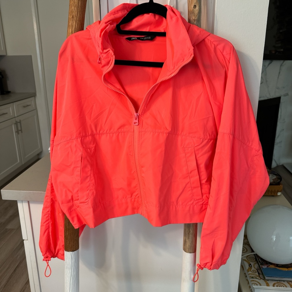 Neon pink windbreaker jacket